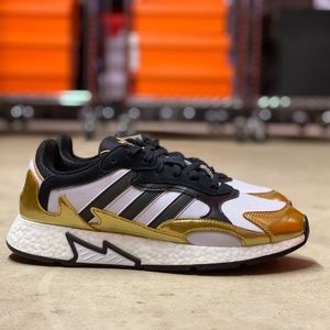 adidas Black, White, and Gold Athletic Shoes